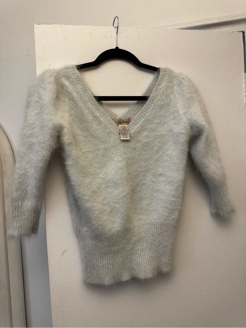 Free People V-Neck Fluffy Sweater in Light Blue. small stain. S-XS